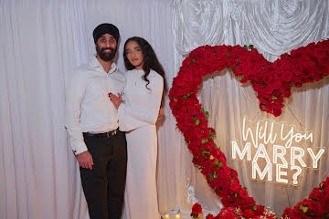 Two people after an extravagant marriage proposal.