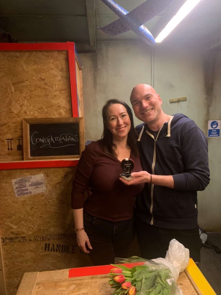 Two people who got engaged in a Darkmaster escape room.